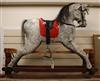 A painted dapple grey rocking horse W.135cm                                                                                            