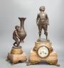 A spelter and marble figural mantel clock and a matching vase 47cm                                                                                                                                                          