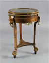 An early 20th century French mahogany and marquetry bijouterie table, Diam.1ft 9in. H.2ft 9in.                                         