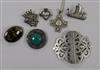 Six assorted silver brooches including Iona and a plated nurse's buckle.                                                               