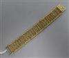 An 14ct gold textured link bracelet, 19.7cm.                                                                                           