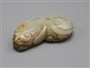 A Chinese pale celadon and russet jade figure of a lion-dog, Qing dynasty                                                              