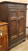 An oak hall cupboard, retailed by Gillows W.112cm                                                                                      