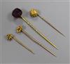 An early 20th century 15ct gold stick pin and three other assorted stick pins.                                                         