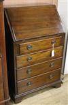 A small mahogany bureau W.63cm                                                                                                         