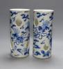 A pair of early 20th century Chinese blue and white hat stands, Kangxi marks, 29cm high                                                                                                                                     