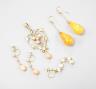 A gold and coral mounted pendant and coral earrings and a pair of amber and gold earrings                                                                                                                                   