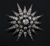 A Victorian gold, silver and diamond starburst pendant brooch, 54mm.