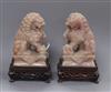 A pair of Chinese hardstone Buddhist lions, wood stands height 13cm                                                                    