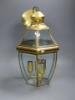 A hexagonal gilt metal and glass hall lantern                                                                                                                                                                               