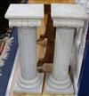 A pair of ionic marble columns W.25cm                                                                                                  