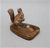 A cold-painted bronze model of a squirrel mounted on a brown onyx ashtray, H 10.5cm inc ashtray                                        