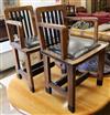 A pair of oak elbow chairs                                                                                                             