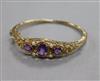 A 1970's Victorian style amethyst and seed pearl hinged bangle,                                                                        