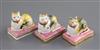 Three Derby porcelain figures of recumbent cats, c.1810-25, L. 4.4cm, one with restored ears                                           