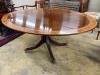 A George III style rosewood banded mahogany oval breakfast table, length 170cm, width 120cm, height 73cm                                                                                                                    