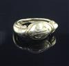 An antique yellow metal ring, the oval head carved with initials, possibly Roman,                                                      