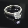 A modern 14ct white gold and solitaire diamond ring, size K/L.                                                                         