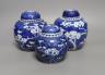 Three 19th century graduated Chinese blue and white ginger jars and covers                                                                                                                                                  