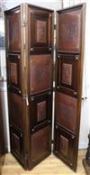 An Edwardian dressing screen with embossed leather panels W.135cm                                                                      