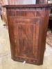 A George III mahogany hanging corner cupboard, width 84cm, depth 43cm, height 121cm                                                                                                                                         