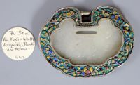 A Chinese silver and enamel mounted white jade 'spirit lock' pendant, Provenance - A. T. Arber-Cooke                                   