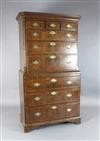 A George II walnut chest on chest, W.3ft 5in. D.1ft 10in. H.6ft 5in.                                                                   