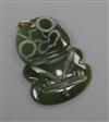 A carved jade pendant, 41mm.                                                                                                           