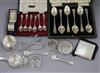 Two cased sets of six silver spoons and other small silver items including napkin rings, strainer etc.                                 