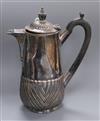 A demi fluted white metal hot water pot.                                                                                               