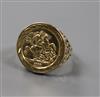 A 9ct gold ring embossed with "half sovereign" decoration, size M.                                                                     