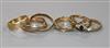 Five assorted 9ct gold rings including gem set and a "Russian" triple wedding ring.                                                    