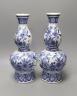 A pair of 19th century Dutch Delft vases - 33.5cm tall                                                                                                                                                                      