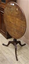 A George III oak tilt top tea table W.74cm                                                                                             