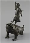 A late Ming bronze joss stick holder of Lui Hai standing on the back of a three legged toad, width 9cm depth 17cm height 22cm          