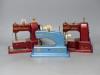 Three vintage hand sewing machines                                                                                                                                                                                          