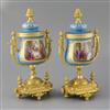 A pair of 19th century French ormolu mounted Sevres style porcelain urns, height 10.75in.                                              