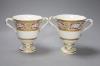 A pair of Derby two handled loving cups, c.1805, painted in arabesque style, pattern no.407, height 14cm                                                                                                                    