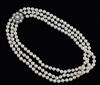 A triple strand cultured pearl choker necklace with 9ct white gold, cultured pearl and diamond set cluster clasp, 38cm.                