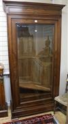 A mid 19th century French walnut bookcase, enclosed by a single plate glass door W.111cm                                               