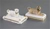 Two Minton porcelain figures of recumbent pug dogs, c.1831-40, L. 10.7cm and 9.3cm, slight faults                                      