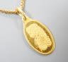 A Suisse '1g Fine Gold' yellow metal pendant, 15mm, on a 750 chain, gross 6.3 grams.                                                                                                                                        