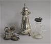 A George V silver mounted whisky tot, a silver sugar caster and a part condiment set.                                                  