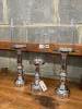 Set of three nickel plated candle stands with glass shades, height 51cm                                                                                                                                                     