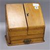 An oak stationery box height 30cm                                                                                                      