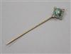 An early 20th century yellow metal, enamel, seed pearl and diamond stick pin, 69mm.                                                    