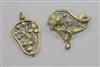 Two yellow metal foliate design pendants.                                                                                              