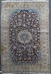 An Isfahan carpet, 8ft 4in by 4ft 8in.                                                                                                 