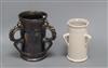 An unusual Dicker ware black lustre three handled tyg and a similar three handled tin glazed pot tallest 18cm                          