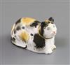 A rare Copeland & Garrett porcelain figure of a recumbent cat, c.1833-47, L. 6cm, ear chips                                            